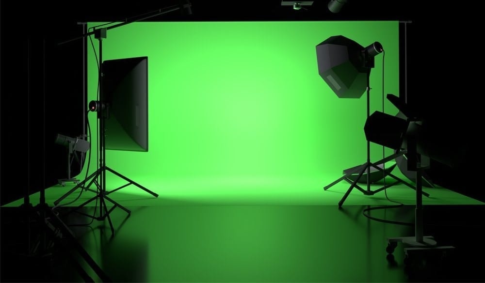 Perfect Moment Studios production space with a green screen and professional lighting